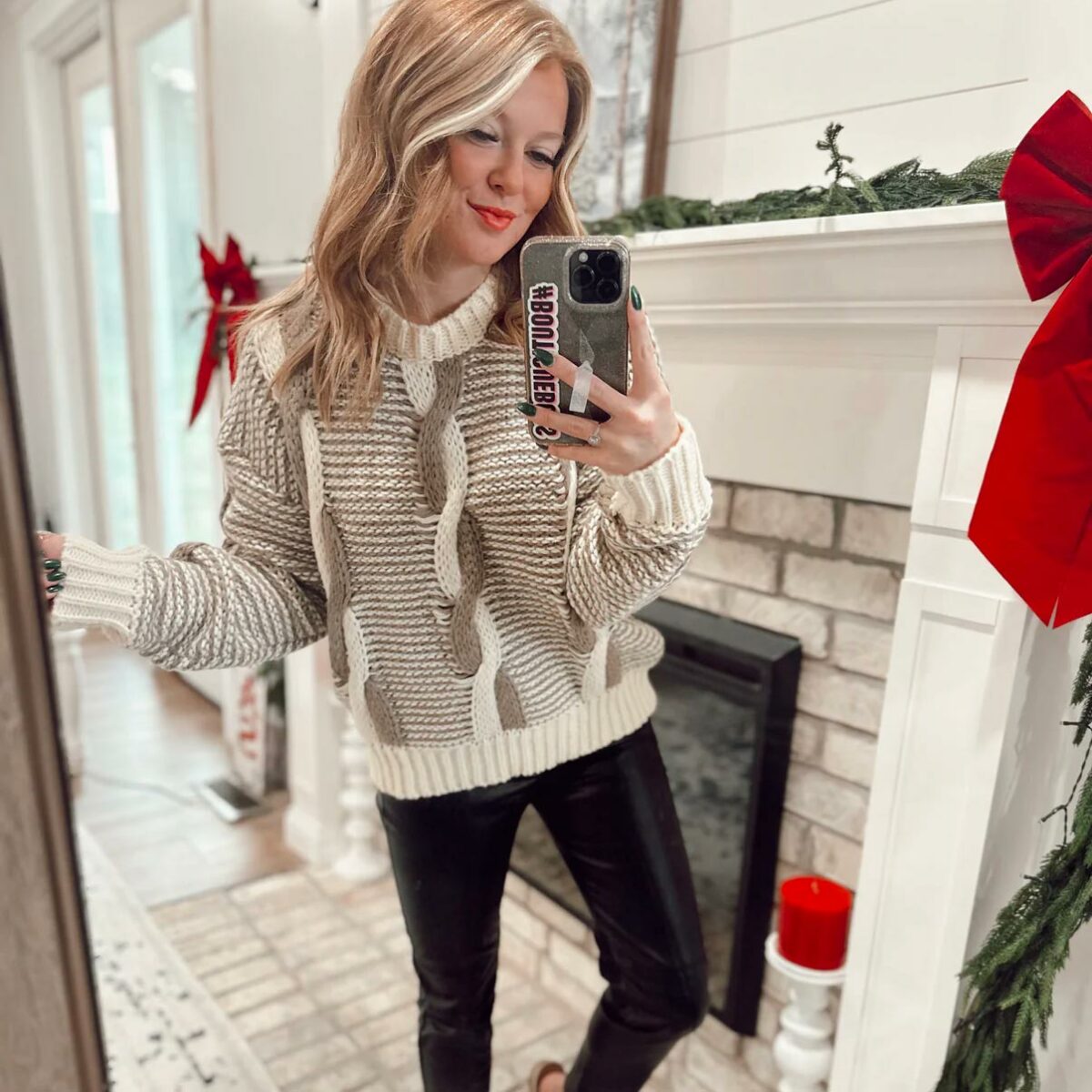Woman taking selfie with a fashion sweater